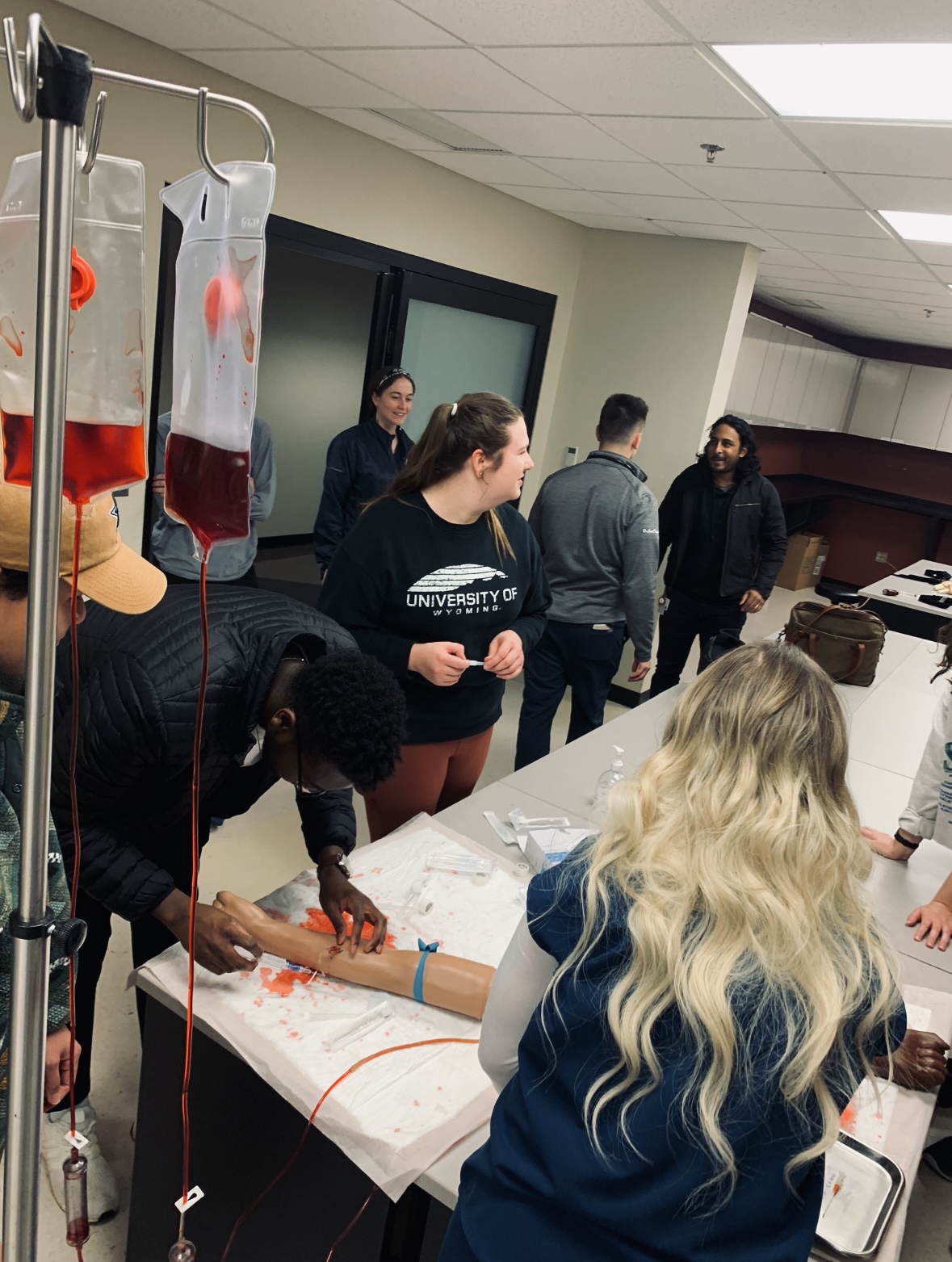 Medical students practicing hands-on skills.